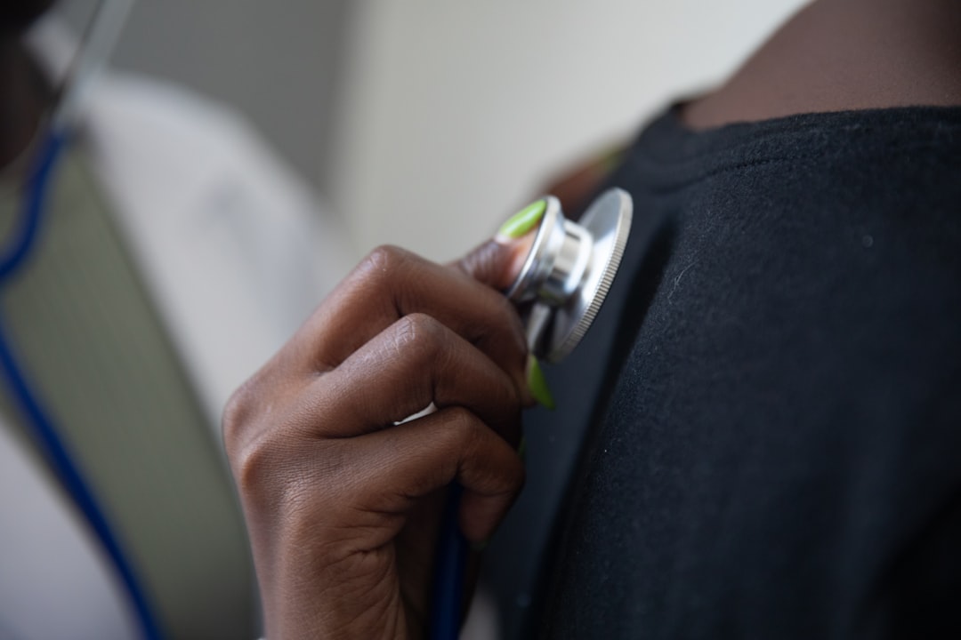 a-person-holding-a-device-huytynqe8jo